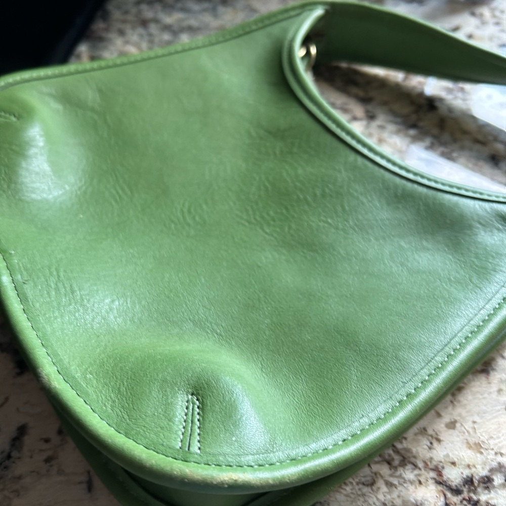 Coach Green Shoulder Bag with Leather Material and Sleek Design